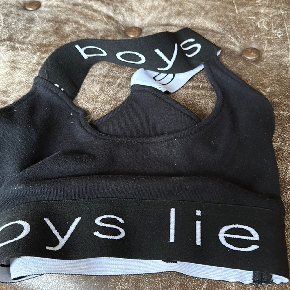 Boys lie top
